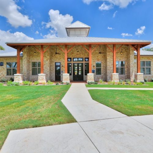 Daytime exterior of clubhouse building
