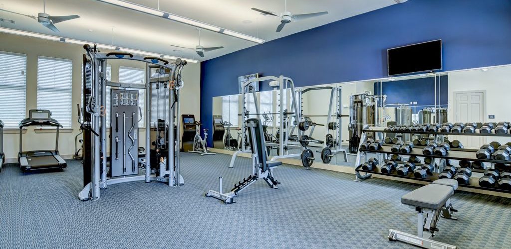 Fitness center with cardio machines and strength training equipment