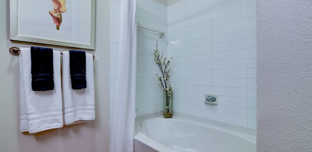 Model apartment bathtub with tile surrounds